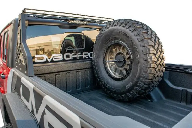 Dv8 Offroad 2019+ Jeep Gladiator Universal Stand Up In-Bed Tire Carrier 1